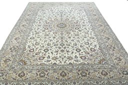 Surface texture of 2000s Kashan rug with natural Wool and intricate pattern