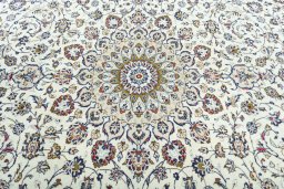 Central medallion detail of 2000s Kashan rug from Iran / Persia