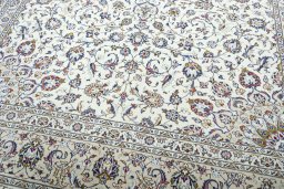 Close-up detail of 2000s Kashan rug from Iran / Persia showing Wool weave