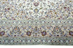 Full view of 2000s Kashan rug from Iran / Persia, 397 × 298 cm in Beige tones