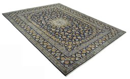 Close-up detail of 2000s Kashan rug from Iran / Persia showing Wool weave