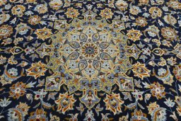 Central medallion detail of 2000s Kashan rug from Iran / Persia