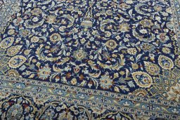 Close-up detail of 2000s Kashan rug from Iran / Persia showing Wool weave