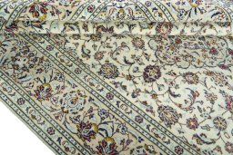 Close-up detail of 2000s Kashan rug from Iran / Persia showing Wool weave