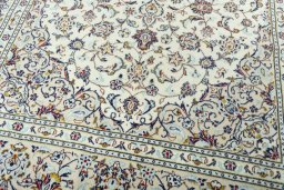 Close-up detail of 2000s Kashan rug from Iran / Persia showing Wool weave