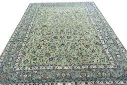 Surface texture of 2000s Kashan rug with natural Wool and intricate pattern