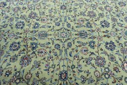 Central medallion detail of 2000s Kashan rug from Iran / Persia