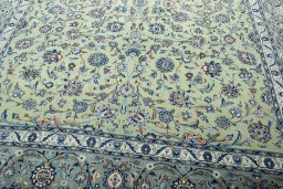Close-up detail of 2000s Kashan rug from Iran / Persia showing Wool weave