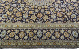 Corner detail of 2000s Kashan rug showing border pattern and Wool pile