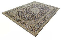 Corner detail of 2000s Kashan rug showing border pattern and Wool pile