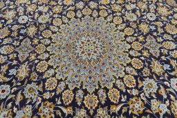 Central medallion detail of 2000s Kashan rug from Iran / Persia