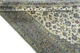 Close-up detail of 2000s Kashan rug from Iran / Persia showing Wool weave