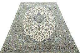 Surface texture of 2000s Kashan rug with natural Wool and intricate pattern