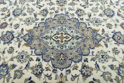 Central medallion detail of 2000s Kashan rug from Iran / Persia