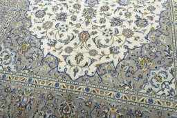 Close-up detail of 2000s Kashan rug from Iran / Persia showing Wool weave