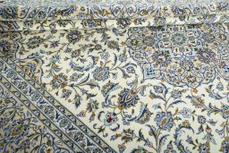 Close-up detail of 2000s Kashan rug from Iran / Persia showing Wool weave