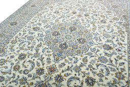 Backside of handmade 2000s Kashan rug showing knot structure and weave density