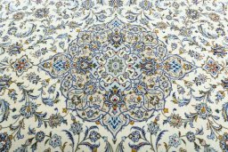 Central medallion detail of 2000s Kashan rug from Iran / Persia