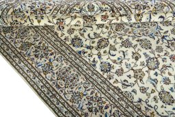 Close-up detail of 2000s Kashan rug from Iran / Persia showing Wool weave