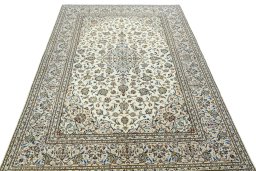 Surface texture of 2000s Kashan rug with natural Wool and intricate pattern