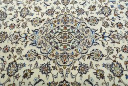 Central medallion detail of 2000s Kashan rug from Iran / Persia