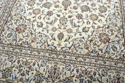 Close-up detail of 2000s Kashan rug from Iran / Persia showing Wool weave