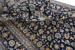 Surface texture of 2000s Kashan rug with natural Wool and intricate pattern