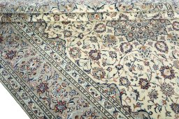 Close-up detail of 2000s Kashan rug from Iran / Persia showing Wool weave