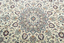 Central medallion detail of 2000s Kashan rug from Iran / Persia