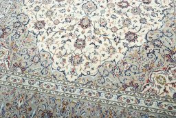 Close-up detail of 2000s Kashan rug from Iran / Persia showing Wool weave