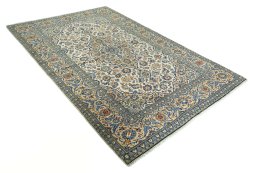 Close-up detail of 2000s Kashan rug from Iran / Persia showing Wool weave