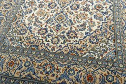 Close-up detail of 2000s Kashan rug from Iran / Persia showing Wool weave