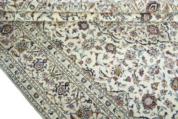 Close-up detail of 2000s Kashan rug from Iran / Persia showing Wool weave