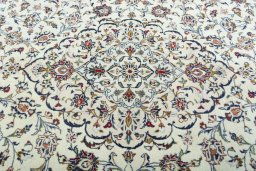 Central medallion detail of 2000s Kashan rug from Iran / Persia