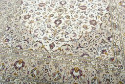 Close-up detail of 2000s Kashan rug from Iran / Persia showing Wool weave