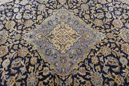 Central medallion detail of 2000s Kashan rug from Iran / Persia