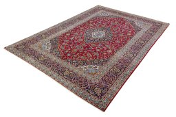 Corner detail of 2000s Kashan rug showing border pattern and Wool pile