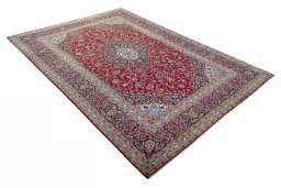 Close-up detail of 2000s Kashan rug from Iran / Persia showing Wool weave