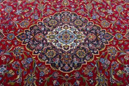 Central medallion detail of 2000s Kashan rug from Iran / Persia