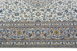 Corner detail of 1970s Kashan rug showing border pattern and Wool pile