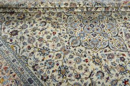 Close-up detail of 2000s Kashan rug from Iran / Persia showing Wool weave