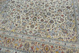 Close-up detail of 2000s Kashan rug from Iran / Persia showing Wool weave