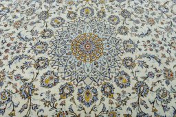 Central medallion detail of 2000s Kashan rug from Iran / Persia