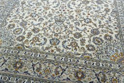 Close-up detail of 2000s Kashan rug from Iran / Persia showing Wool weave