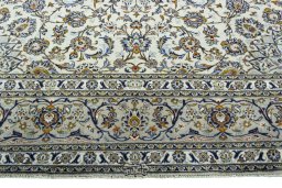 Full view of 2000s Kashan rug from Iran / Persia, 402 × 291 cm in Beige tones
