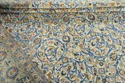 Close-up detail of 2000s Kashan rug from Iran / Persia showing Wool weave