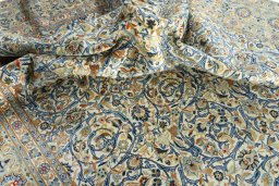 Surface texture of 2000s Kashan rug with natural Wool and intricate pattern