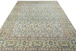 Surface texture of 2000s Kashan rug with natural Wool and intricate pattern