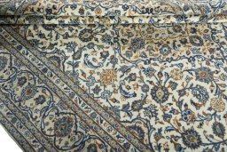Close-up detail of 2000s Kashan rug from Iran / Persia showing Wool weave