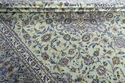 Close-up detail of 2000s Kashan rug from Iran / Persia showing Wool weave